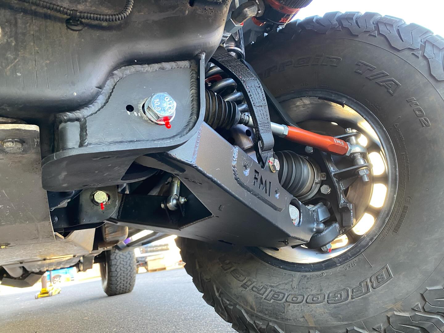 Lower arm pocket replacement kit for 2017-2024 Raptor, showcasing durable construction and suspension components.