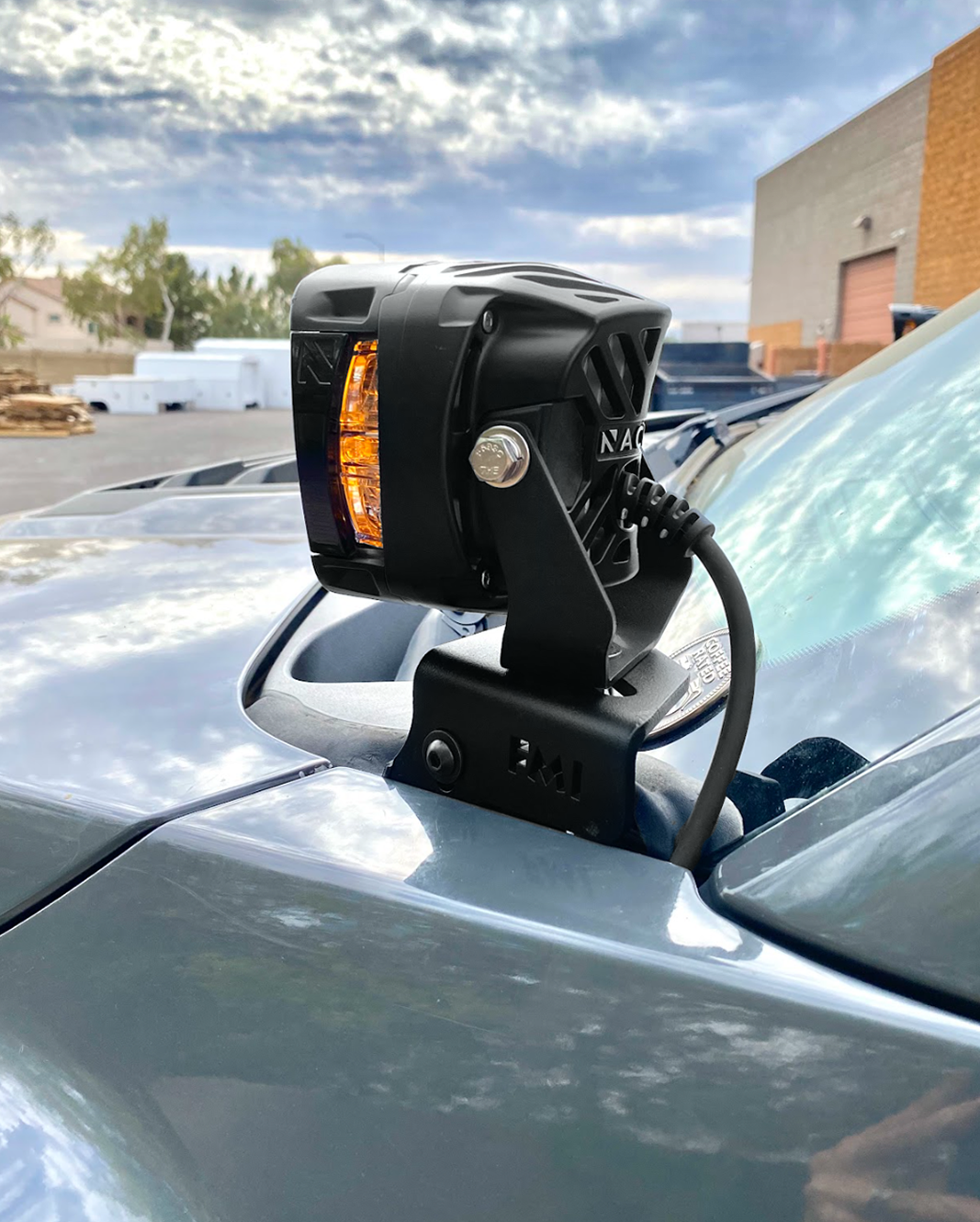 Front A-Pillar light mount kit for 2017-2020 Gen 2 Raptor, showcasing a mounted light on a truck's roof.