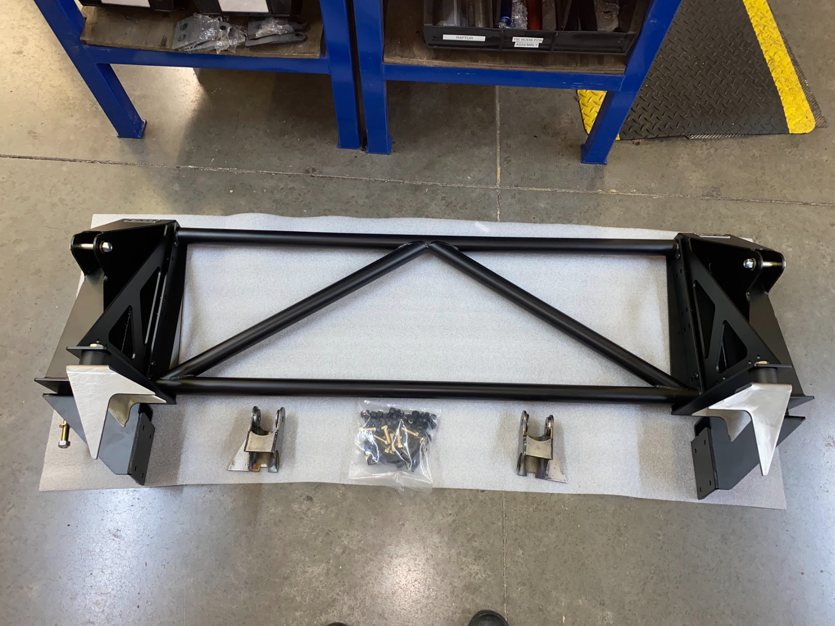 2017-2020 Raptor rear bed cage shock tower designed for 20.25-inch wheel travel, featuring a sturdy black metal frame.