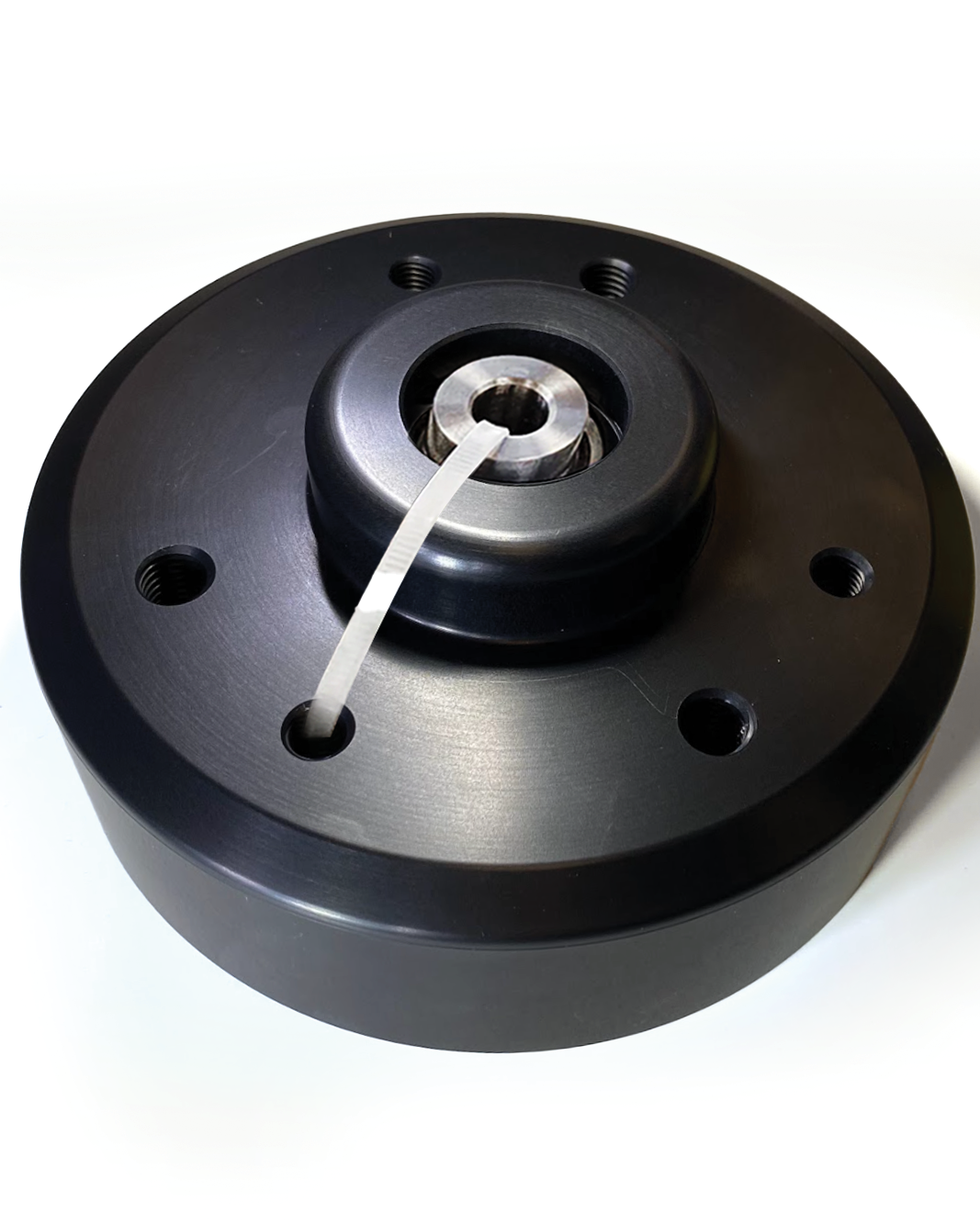 Billet top hat for 2017-2020 Raptor with 2-inch lift for stock shock, designed for enhanced offroad performance.