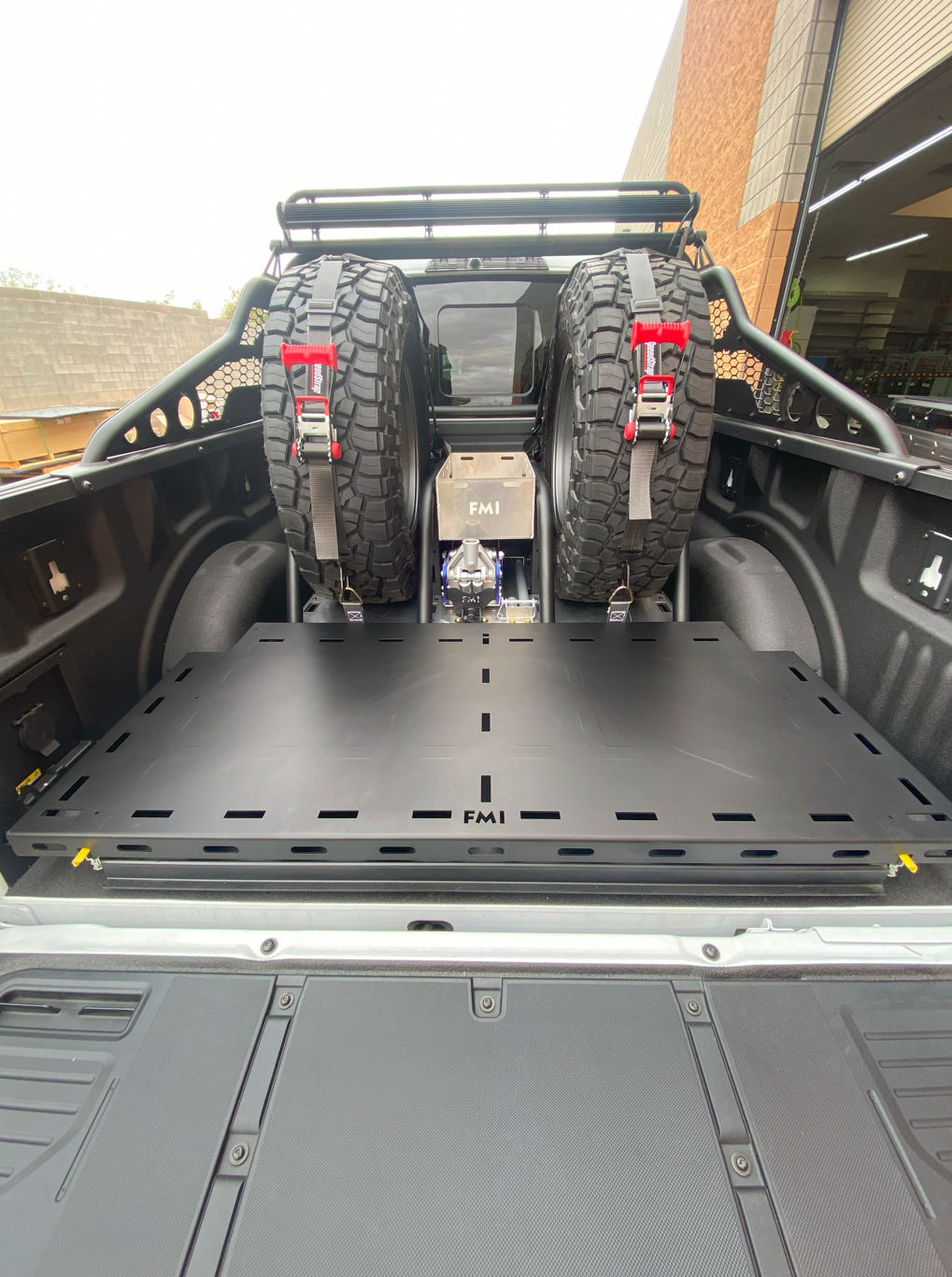 Ford Raptor modular bed organizer featuring a slide-out cargo tray, designed for efficient storage and easy access.