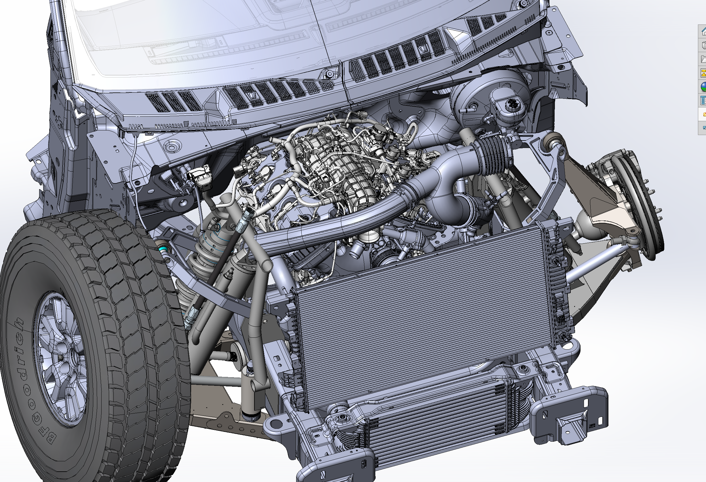 2017 Up Raptor Long Travel Front Suspension Kit showcasing detailed suspension components and engine layout for enhanced off-road performance.