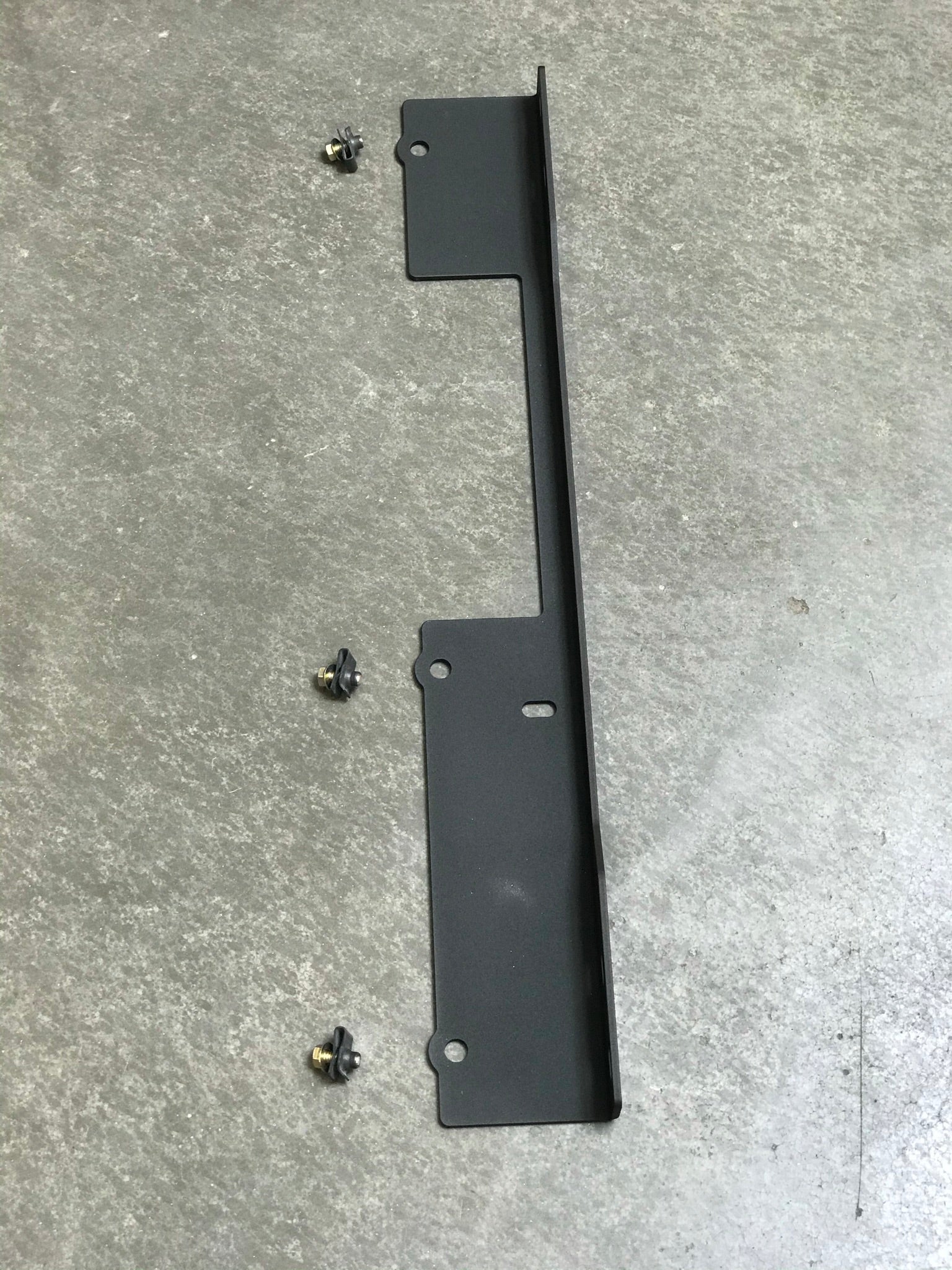 2021-2024 Ram TRX skid plate kit showing underbody protection component with mounting hardware. Durable and rugged design.