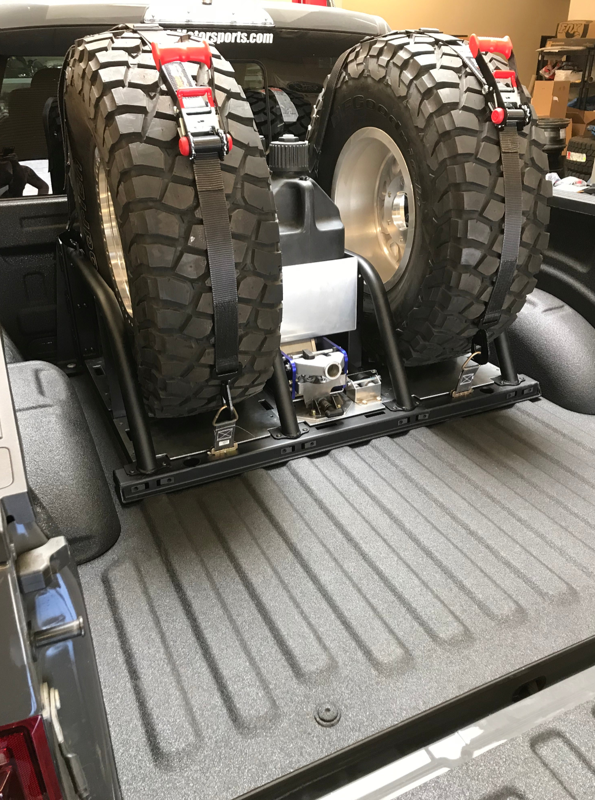2021+ Raptor 5-Link Rear Bed Organizer with dual spare tires and shock mounts for enhanced offroad utility and storage.