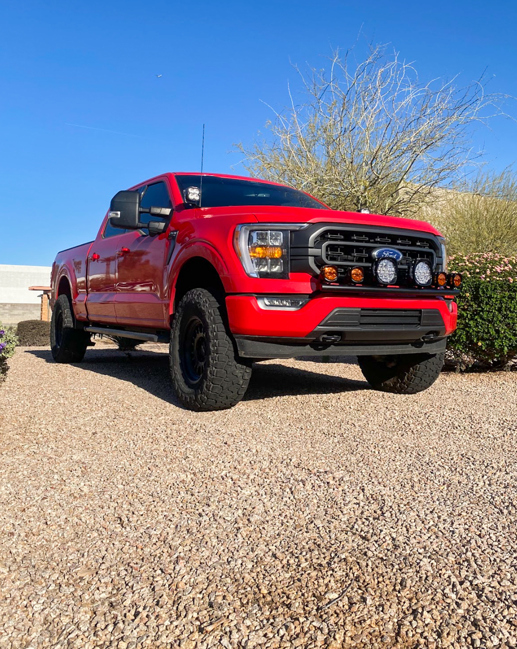 2021-2023 Ford F150 with front light mount on stock bumper, showcasing rugged design and off-road capability.