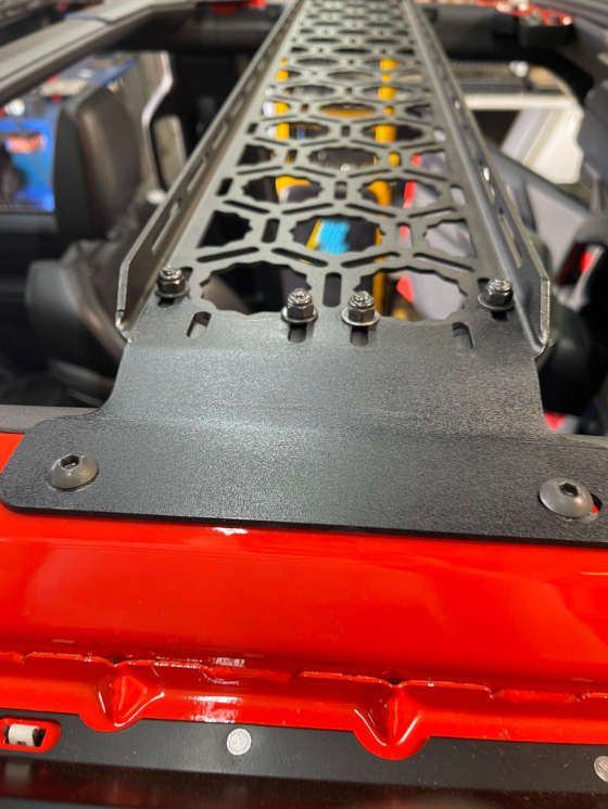 Inside view of a Bronco 2021 roof panel mount by Adapt-A-Panel, showcasing a sturdy metal design for enhanced utility.