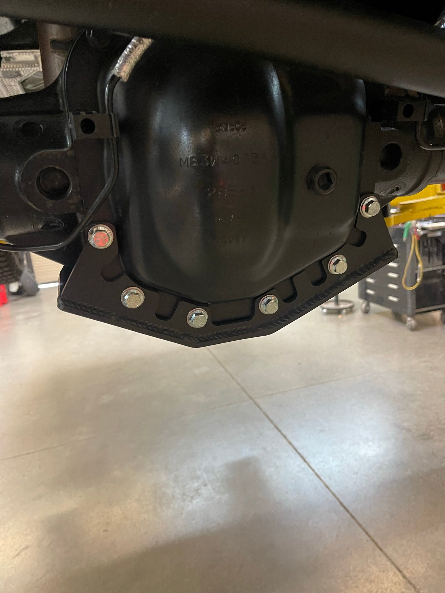 2021 and up Ford Bronco rear differential skid plate showcasing durable design and secure bolt installation for offroad protection.