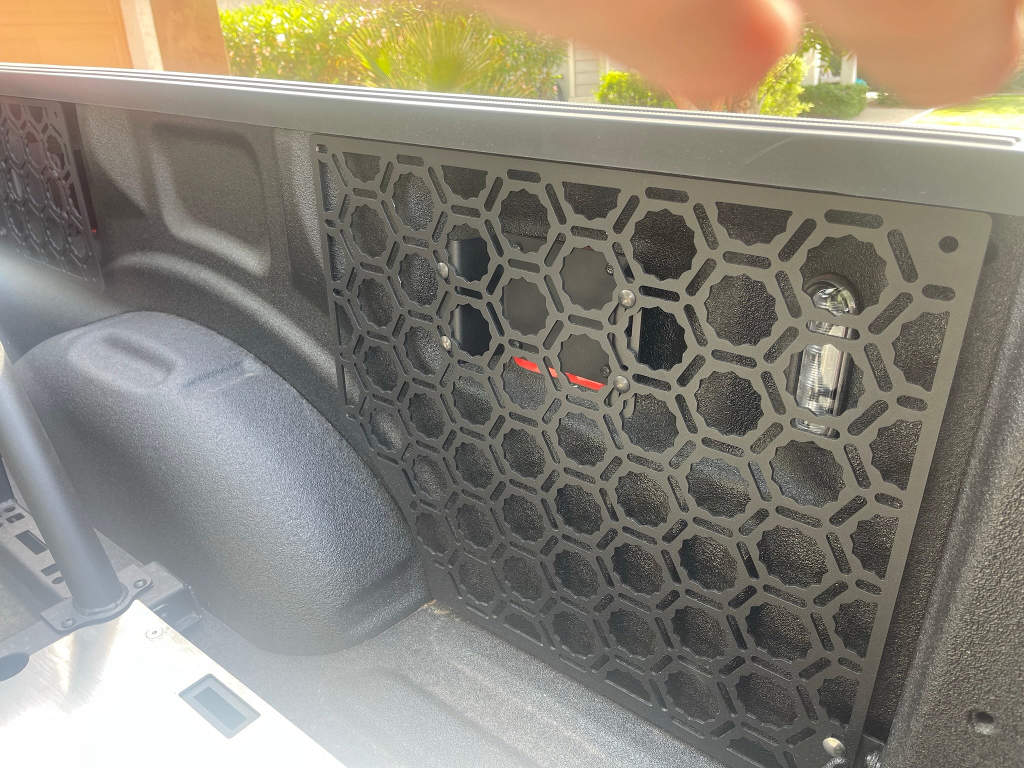 Bedside organizer panel kit for 2021-2023 Ford Raptor and F150, featuring a durable design for efficient storage.