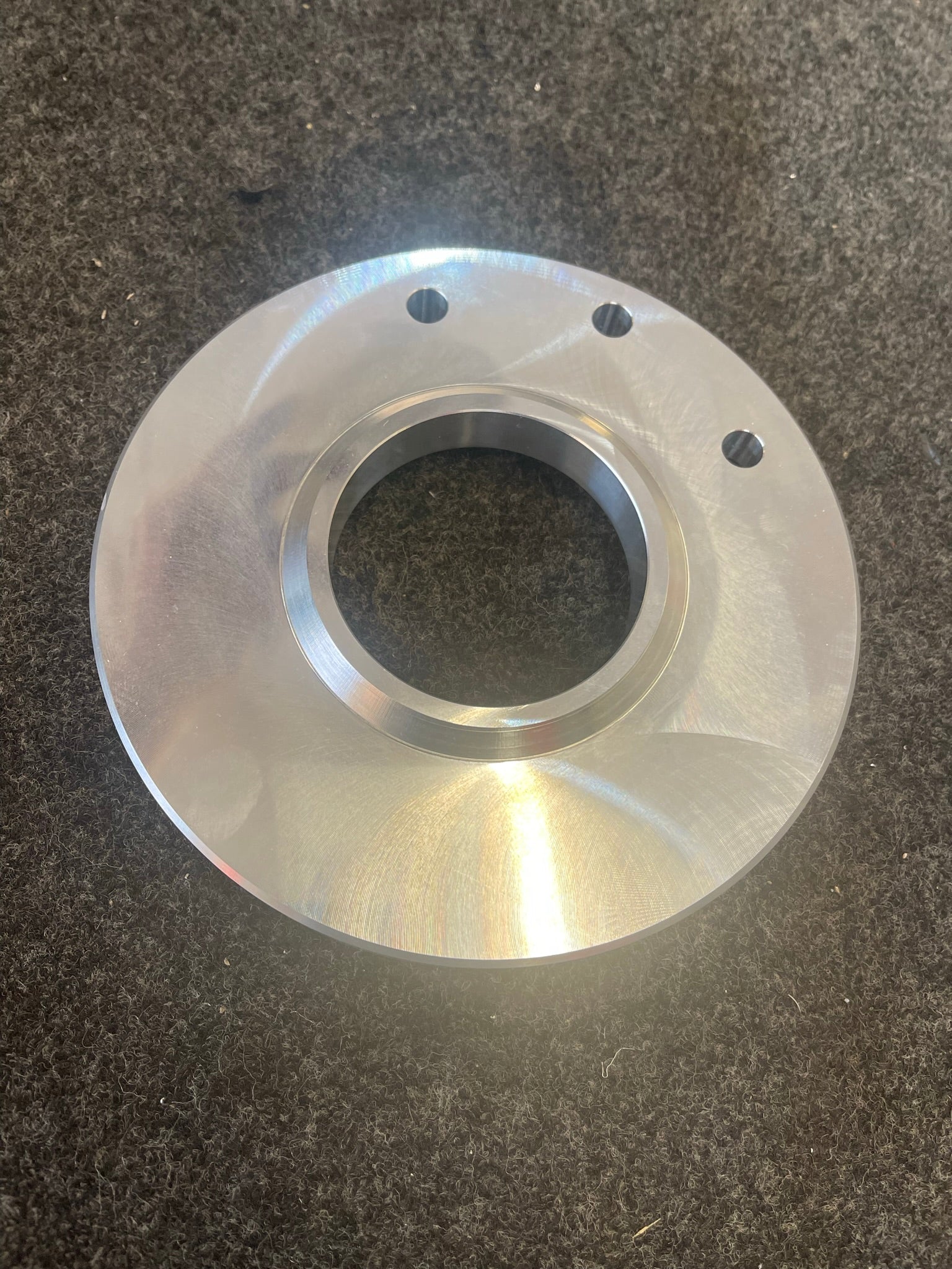 2021 and up Raptor rear spring 1-inch spacer lift kit by Foutz Motorsports, featuring a polished aluminum design.