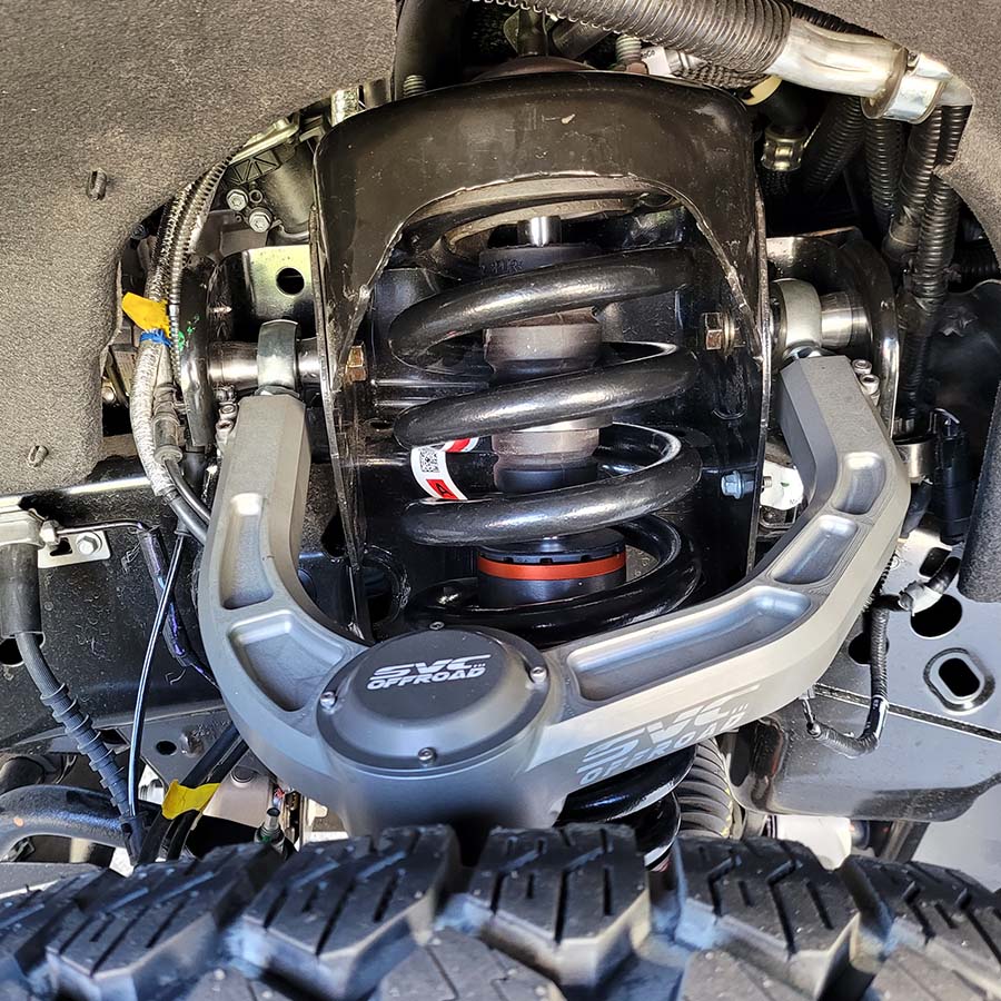 2021+ Raptor upper control arms showcasing durable construction and advanced suspension design for enhanced off-road performance.