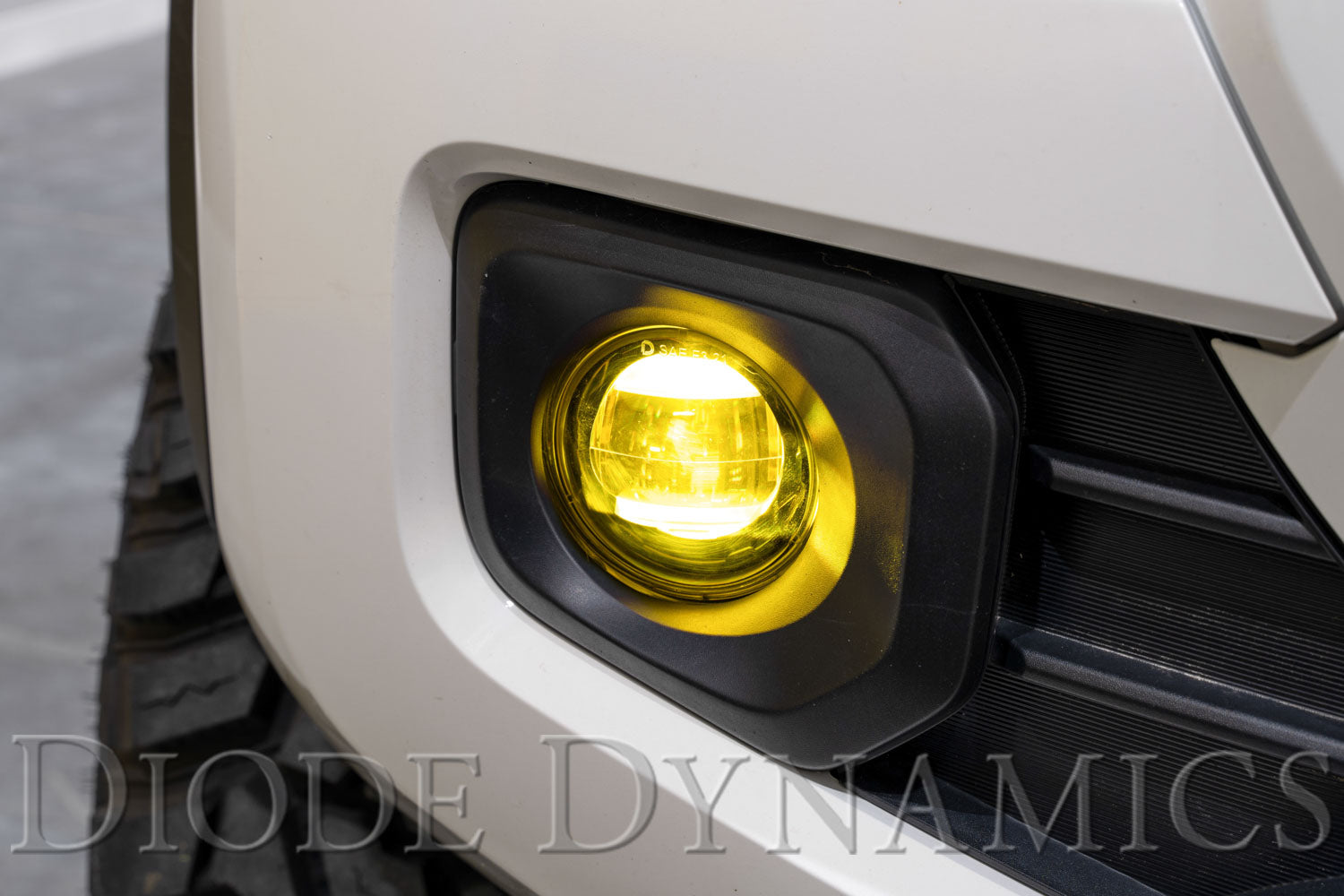 2021_toyota_tacoma_elite_foglamp_studio_close_passenger_on.jpg