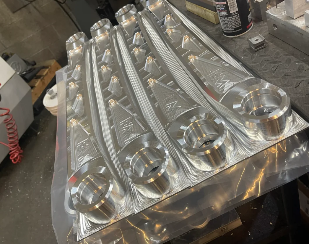 2024 Ranger Raptor rear suspension kit featuring billet aluminum arms and ultra-flex joints, designed for enhanced offroad performance.