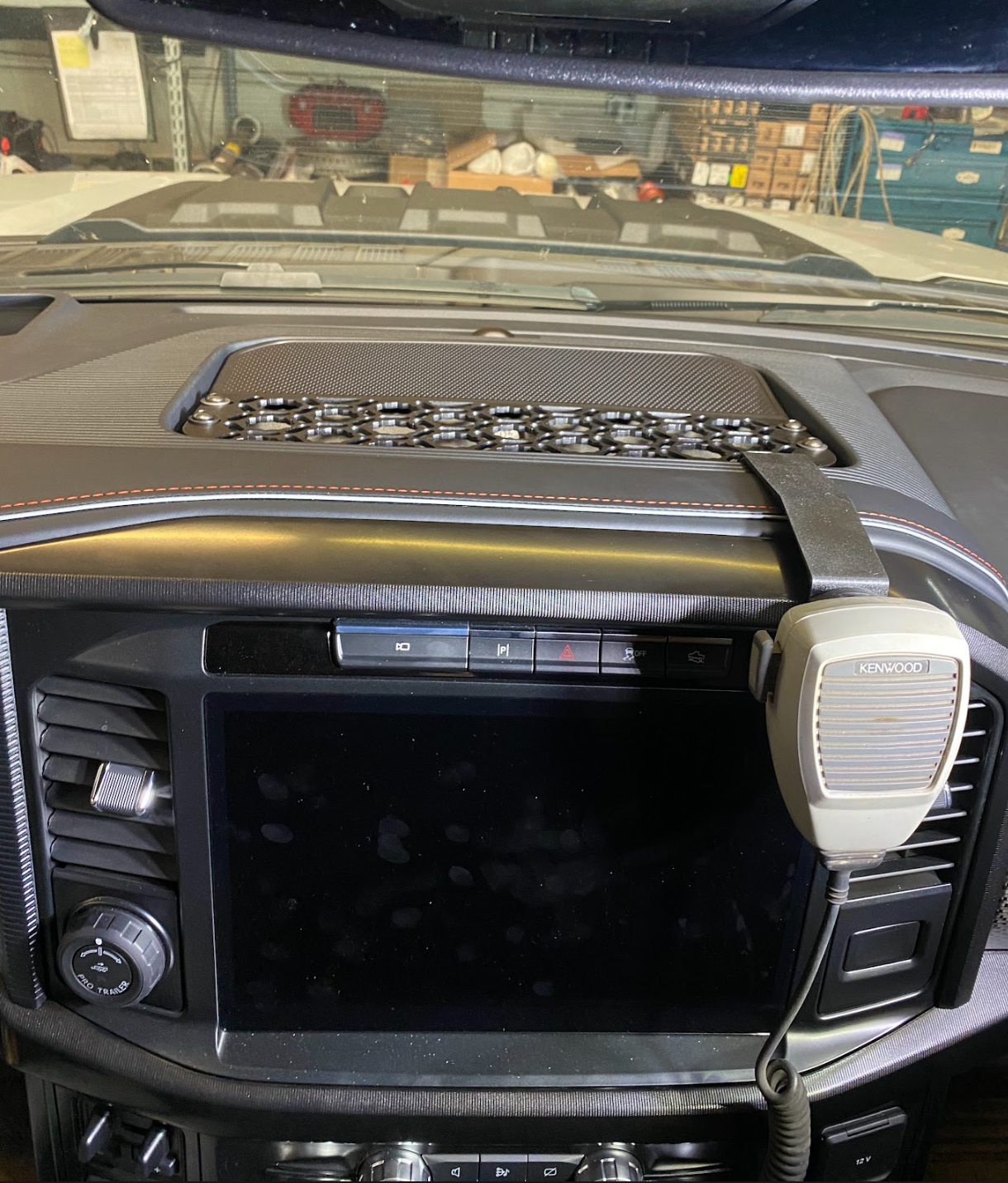 2024 F150 Raptor center dash mount kit by Adapt-A-Panel, featuring a sleek design and integrated control panel for accessories.