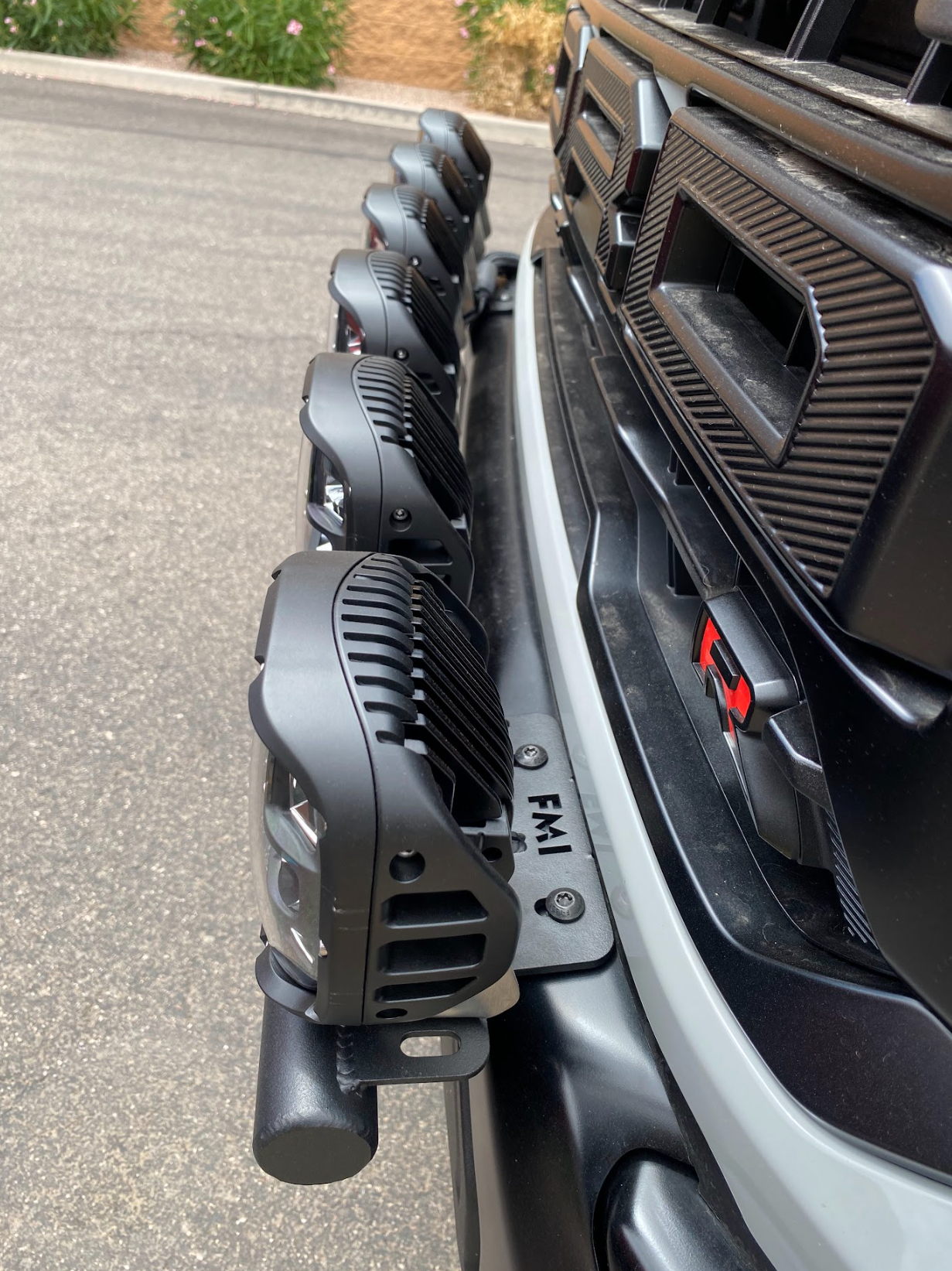 2024 Raptor Front Light Mount Kit for modular bumpers, featuring multiple adjustable light mounts for custom lighting options.
