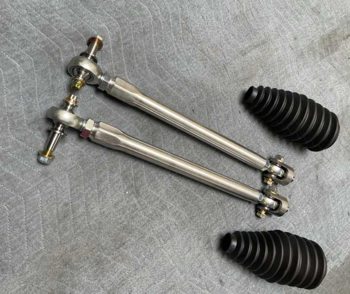2024 Ranger Raptor Billet Tie Rod Kit with two tie rods and rubber boots for enhanced offroad performance.