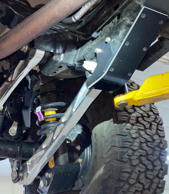 2024 Ranger Raptor rear lower arm frame guard with HDPE slide, showcasing durable protection for offroad performance.