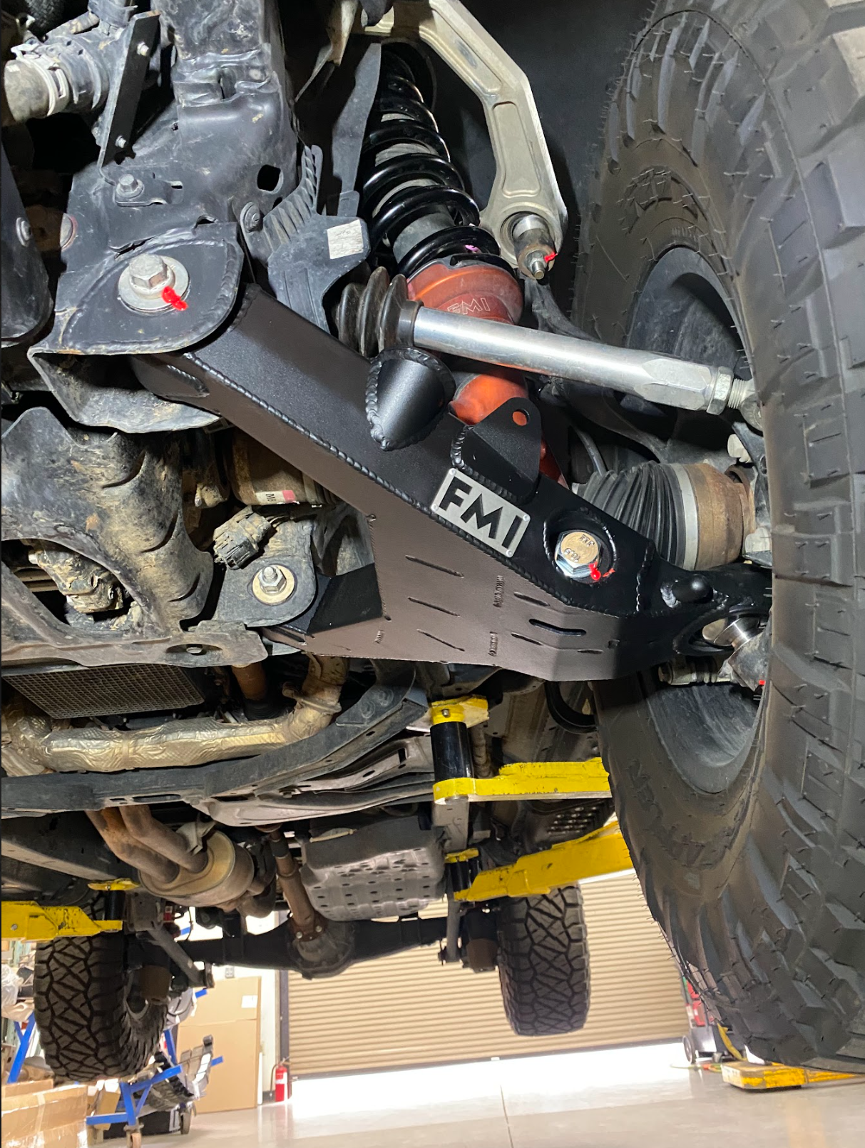 2024+ Ranger Raptor fabricated lower A-arm kit showcasing stock width, designed for enhanced offroad performance and durability.