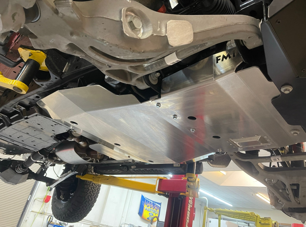 2024 Ford Ranger Raptor skid plate installed, showcasing durable aluminum construction and undercarriage protection.