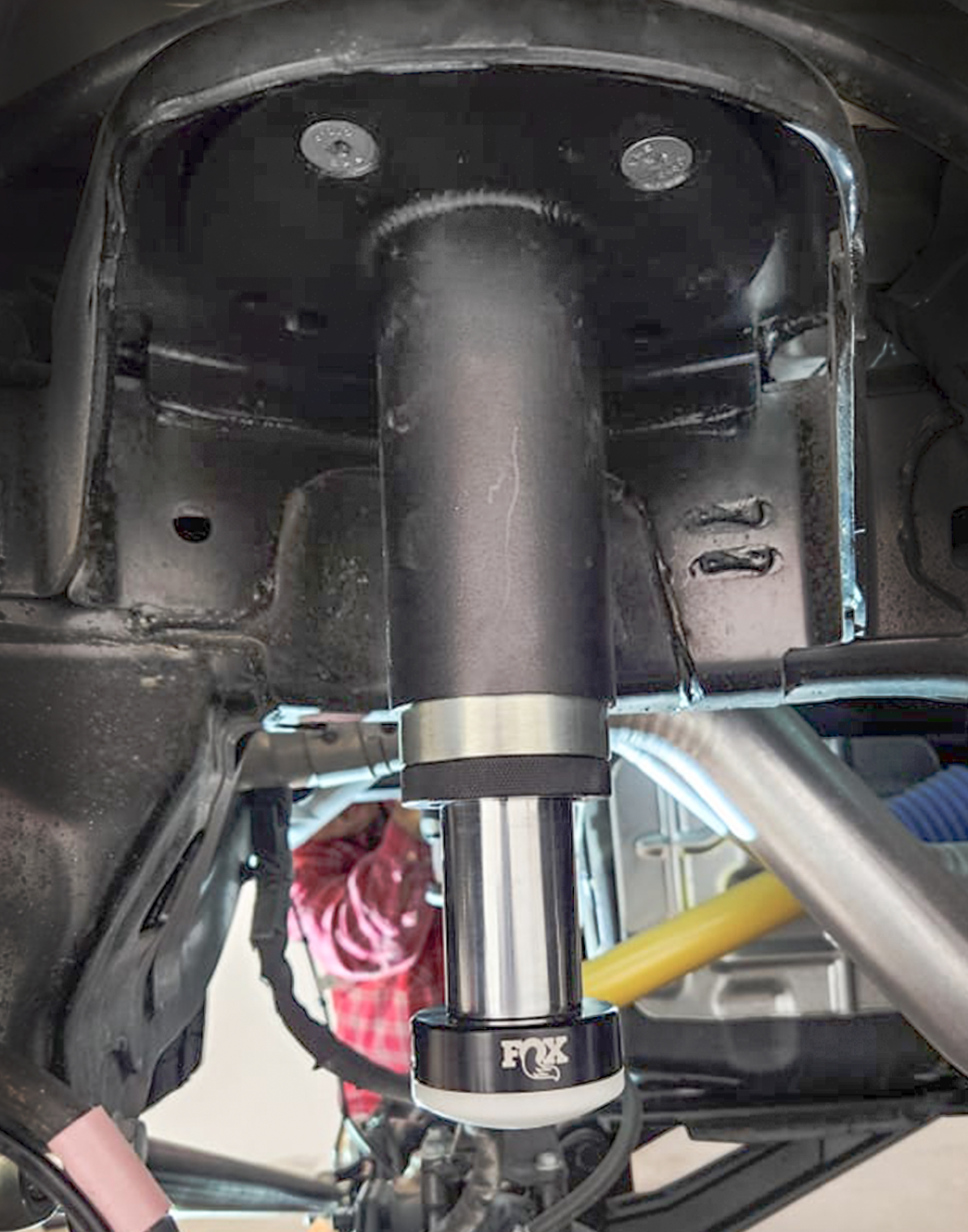 2025 Ram RHO Rear Hydraulic Bump Stop Kit installed on a truck's suspension system for enhanced performance and durability.