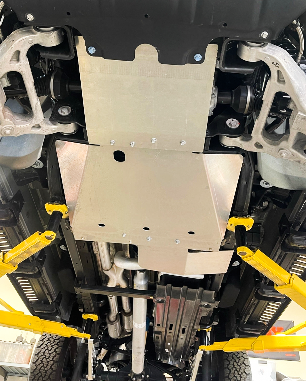 2025 Ram RHO underbody protection skid plate kit installed, showcasing durable aluminum design for offroad safety.
