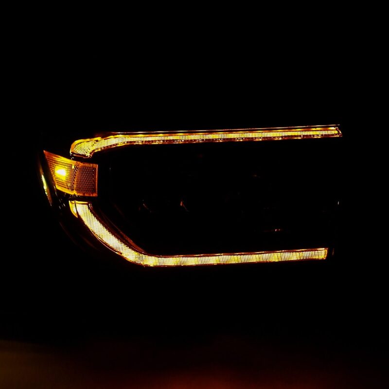 AlphaRex NOVA LED projector headlights for 07-13 Toyota Tundra in alpha-black with sequential signals and DRL.