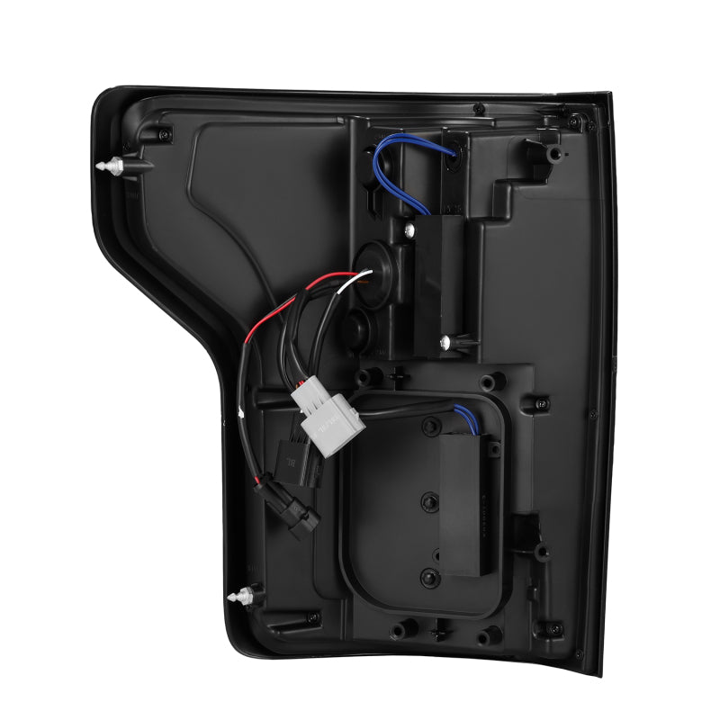 AlphaRex Luxx-Series LED tail lights for 15-20 Ford F150 in Alpha-Black, showcasing the back view and wiring connections.