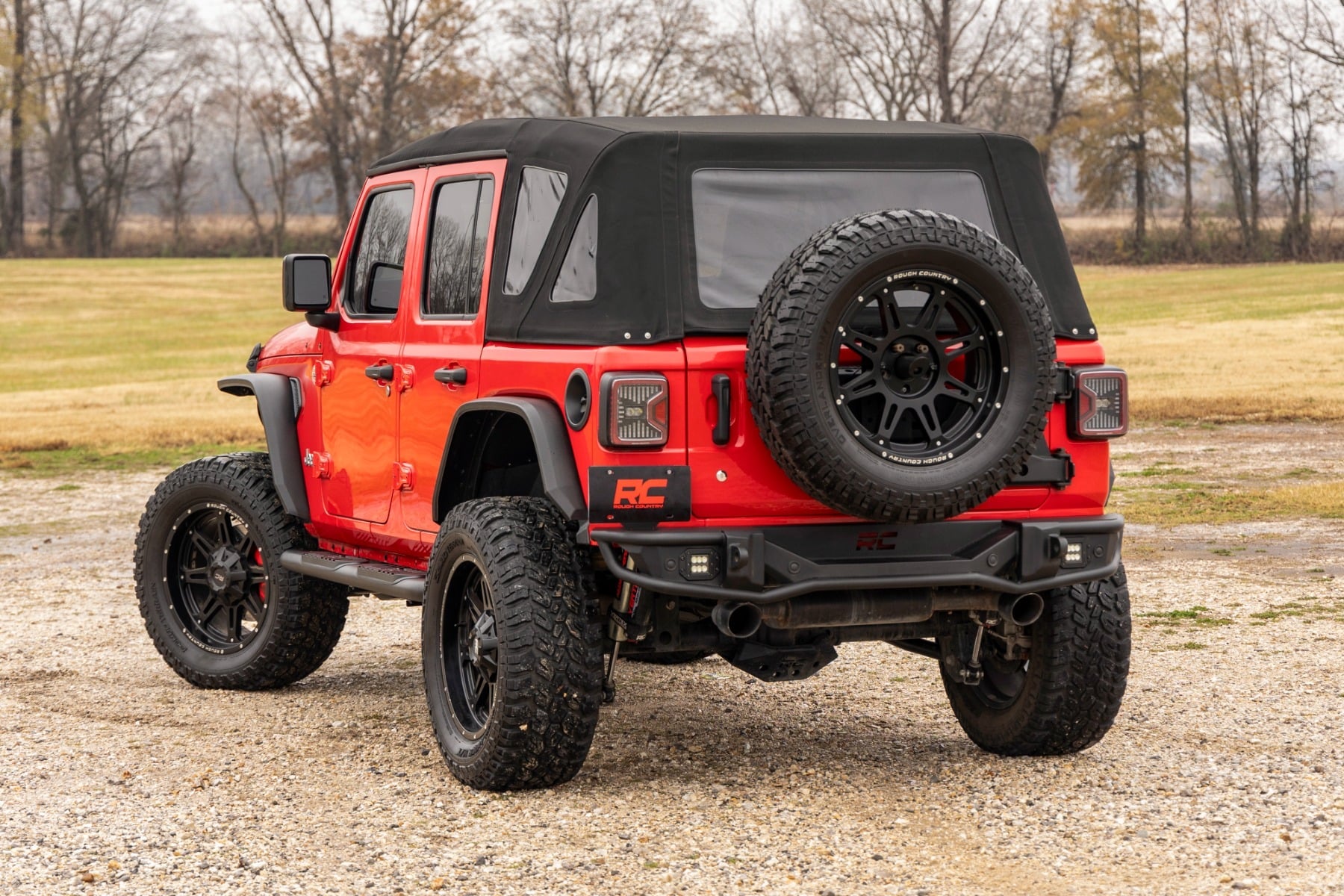 Oval Nerf Steps 4 Door Black Jeep Wrangler Unlimited 4WD (2018-2026) Rough Country