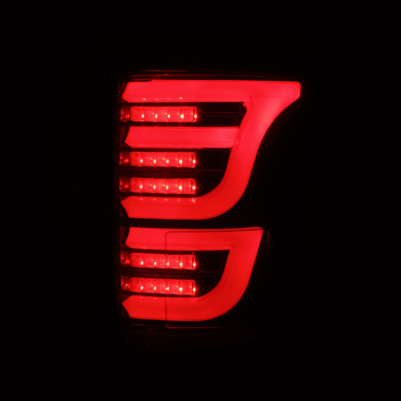 AlphaRex Luxx LED tail lights for 15-20 Ford F-150 in black and red, featuring a sleek design and bright illumination.