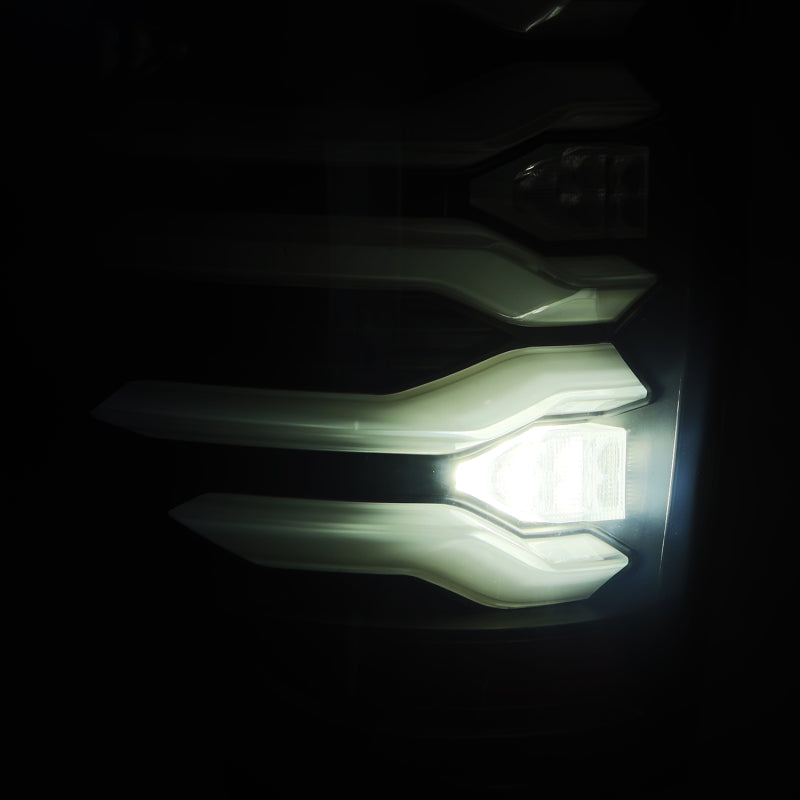 AlphaRex 09-14 Ford F150 LUXX LED taillights with black housing, showcasing sleek design and modern lighting features.