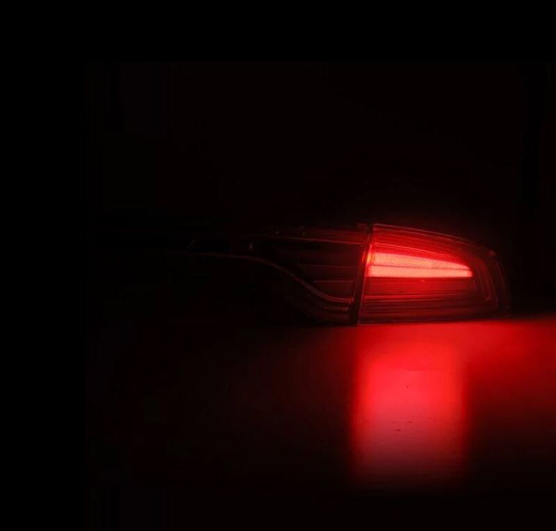 AlphaRex Nova-Series LED tail light for 2015-2023 Dodge Charger in black, showcasing a sleek design with red illumination.