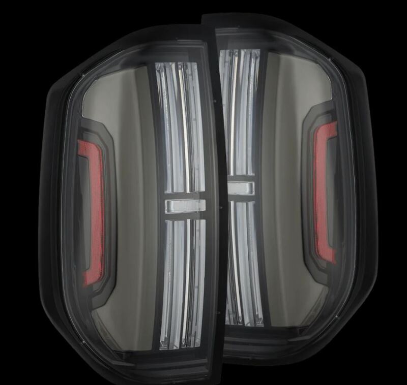 AlphaRex Nova-Series LED tail lights for 2014-2021 Toyota Tundra in alpha-black finish, featuring sleek design and enhanced visibility.