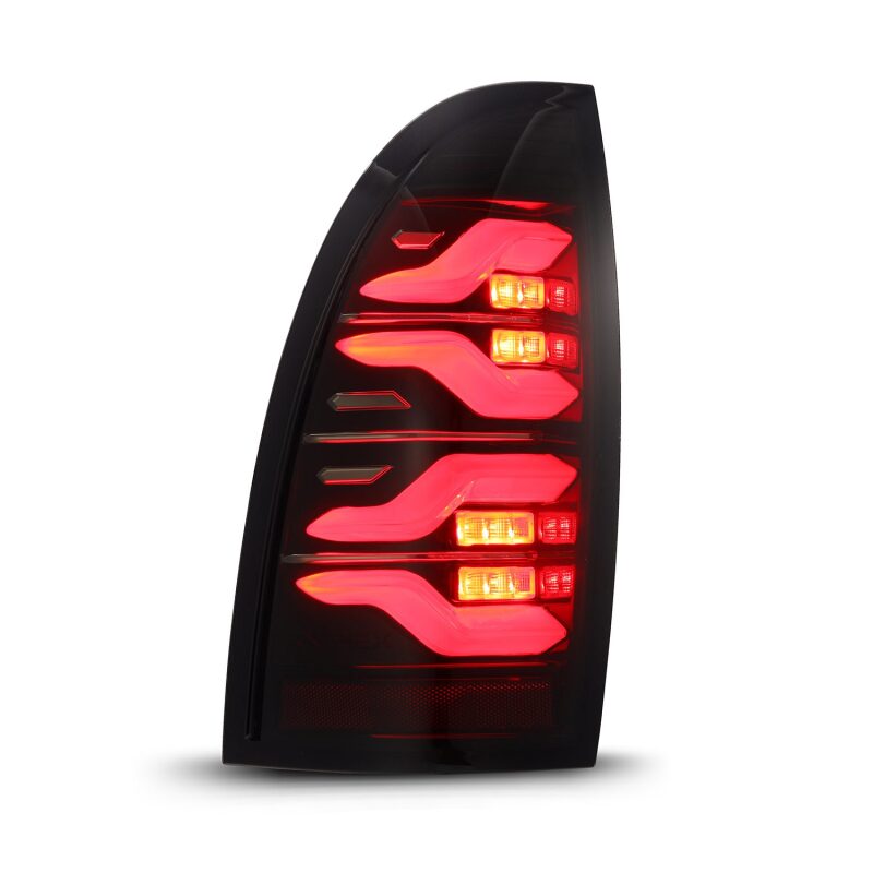 AlphaRex LUXX LED taillights for 05-15 Toyota Tacoma in black and red with sequential signal and active light features.