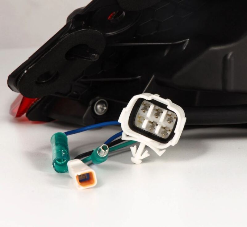 AlphaRex 22-24 Toyota GR86 LUXX LED taillights in vivid red with wiring connectors for installation.