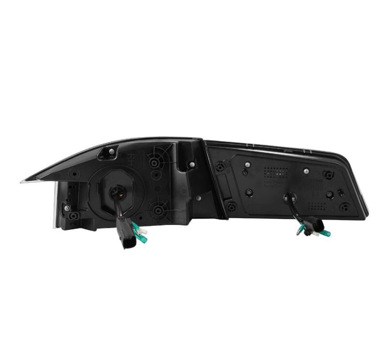 AlphaRex LUXX-Series LED tail light for 12-21 Tesla Model S in black and red, showcasing the rear assembly and connectors.