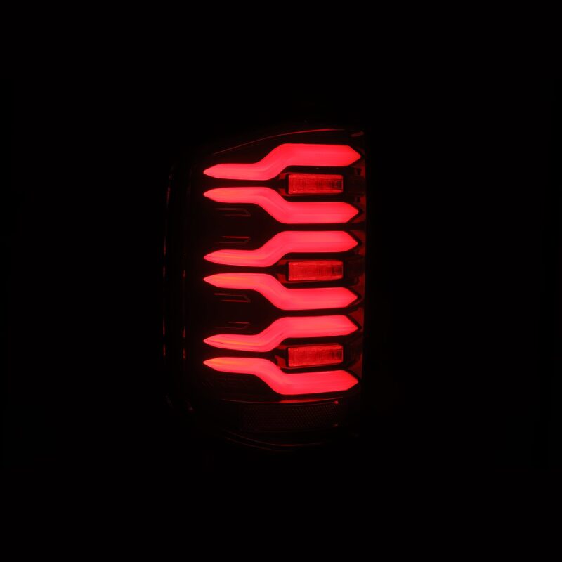 AlphaRex Luxx-Series LED tail lights for 14-18 Chevy Silverado 1500 in black and red with sequential signals.