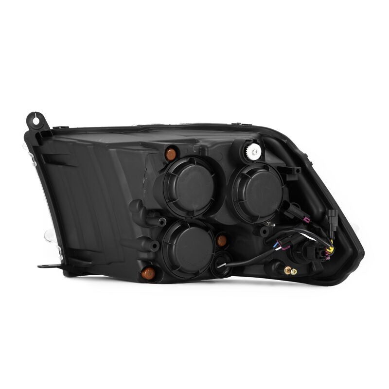 AlphaRex 09-18 RAM 1500 PRO-Series projector headlights in alpha-black with sequential signal and DRL features.