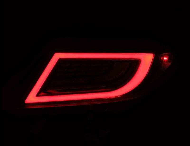 AlphaRex 22-24 Toyota GR86 LUXX LED taillights in vivid red, showcasing a sleek and modern design for enhanced visibility.