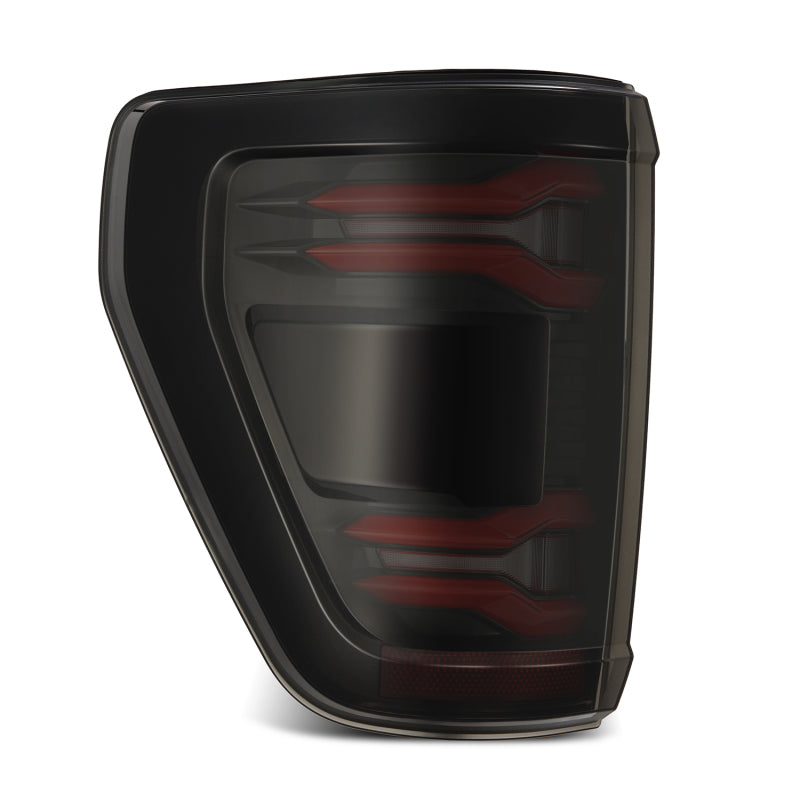 AlphaRex LUXX LED taillights for 21-23 Ford F-150 in black and red with BLIS feature, enhancing visibility and style.