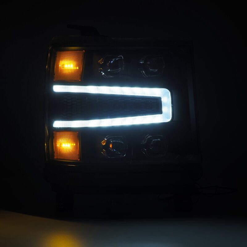 AlphaRex NOVA-Series LED projector headlights for 16-18 Chevy 1500HD with sequential signals and daytime running lights.