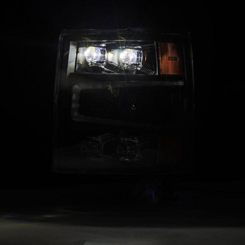 AlphaRex NOVA-Series LED projector headlights for 04-15 Chevy 1500HD with black housing and sequential signals.