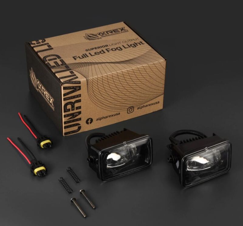 AlphaRex dual color LED projector fog lights for 2015-2020 Ford F150 and 2017-2022 Super Duty, with installation accessories.