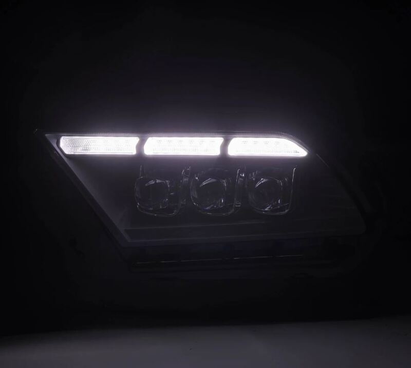 AlphaRex NOVA-Series LED projector headlights for 10-12 Ford Mustang, featuring black housing, sequential signals, and daytime running lights.