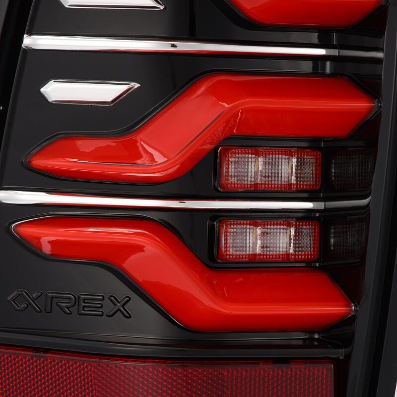 AlphaRex LUXX LED taillights for 05-15 Toyota Tacoma in black and red with sequential signal and active light features.
