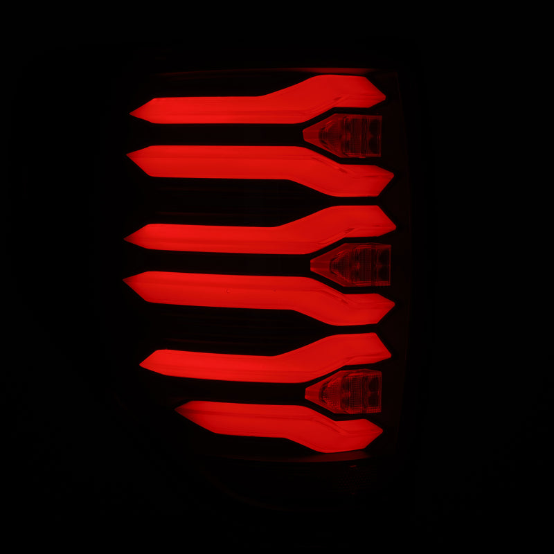 AlphaRex LUXX LED taillights for 09-14 Ford F150 with black housing, featuring a modern, sleek design and bright red illumination.