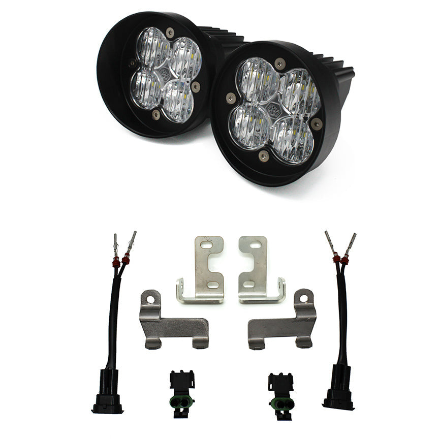 Baja Designs Squadron SAE Fog Light Kit for Tacoma, Tundra, and 4Runner with mounting hardware and connectors.