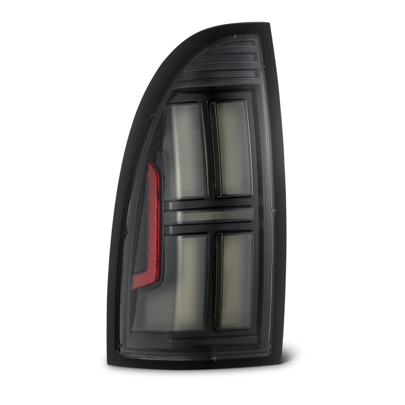 AlphaRex NOVA Prismatic LED tail lights for 2005-2015 Toyota Tacoma in alpha-black finish, featuring a sleek design.
