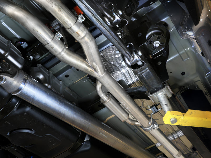 Vulcan Series Cat-Back Exhaust System for 2025 RAM 1500 V6-3.0L, showcasing stainless steel piping and installation components.