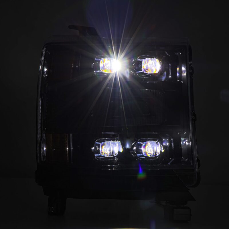 AlphaRex NOVA-Series LED projector headlights for 2016-2018 Chevy 1500HD, featuring sequential signals and daytime running lights.