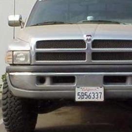 Front view of a 1994-2002 Dodge Ram showcasing aftermarket fenders designed for enhanced durability and style.
