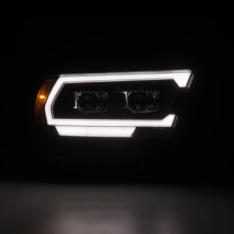 AlphaRex 19-22 Dodge Ram 1500 PRO-Series black projector headlights with sequential signal and DRL features.
